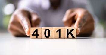 wooden blocks that spell out: "401k"