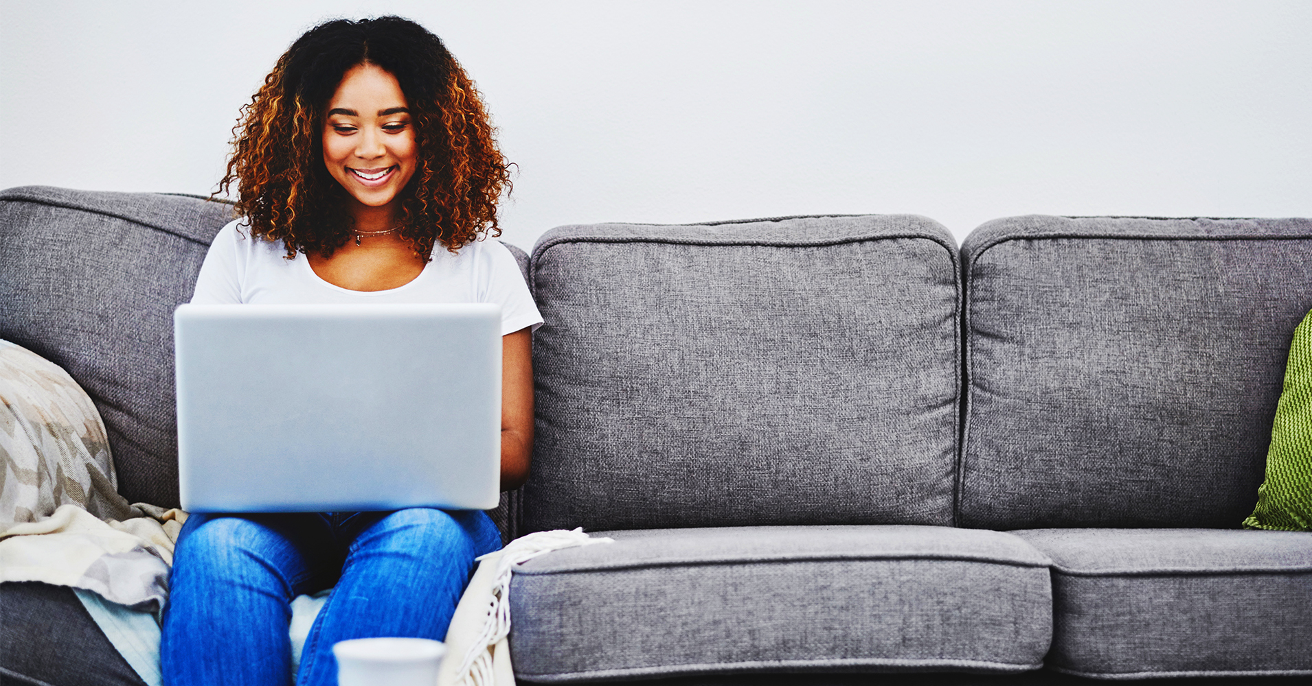 After researching how to apply for a HELOC, a woman fills out a HELOC application online.